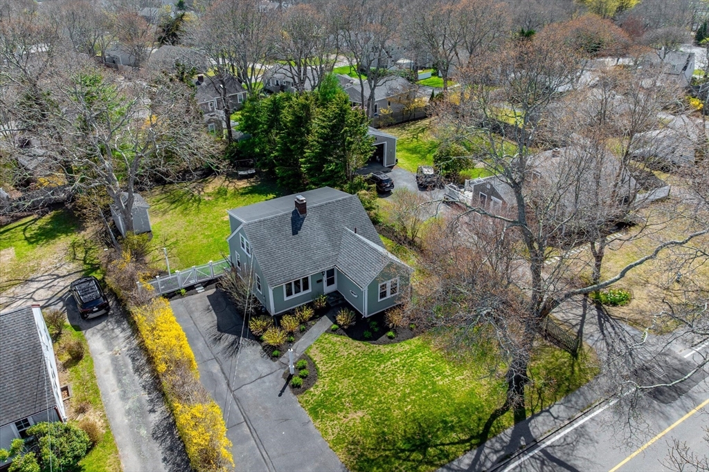 69 Jericho Path Falmouth, MA 02540 - Photo 34 of 42 an aerial view of a house with yard swimming pool and outdoor seating