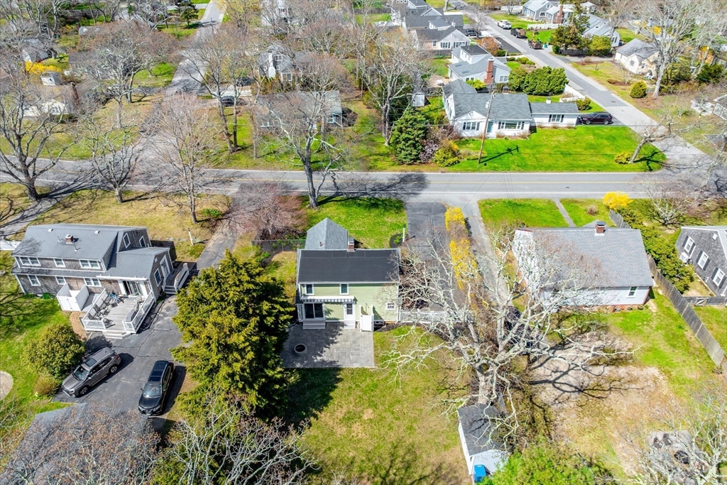69 Jericho Path Falmouth, MA 02540 - Photo 37 of 42 an aerial view of a house with a garden
