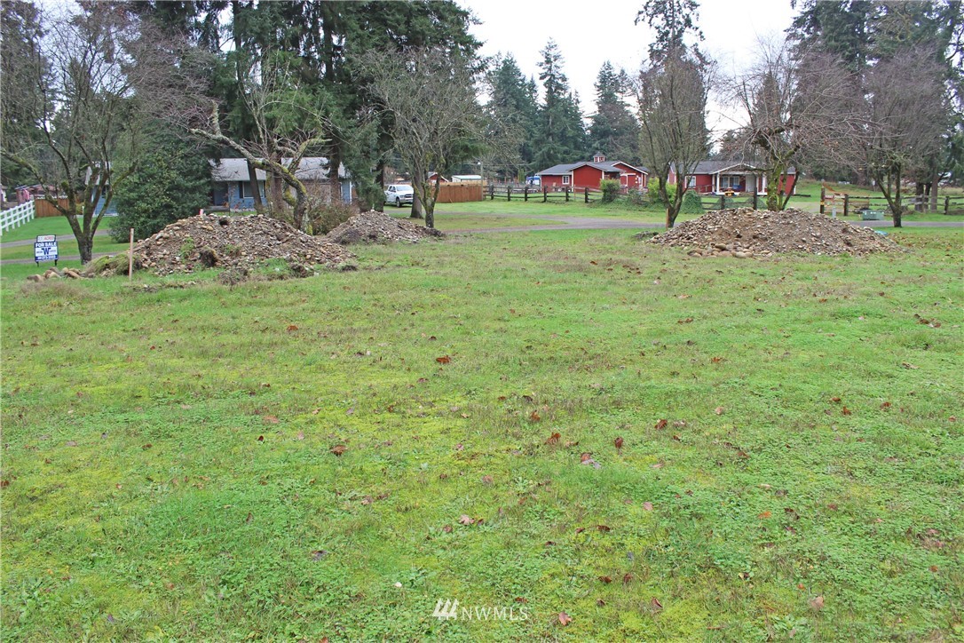 17133 Sargent Road Southwest Rochester, WA 98579 - Photo 7 of 14 a small garden covered with tall trees
