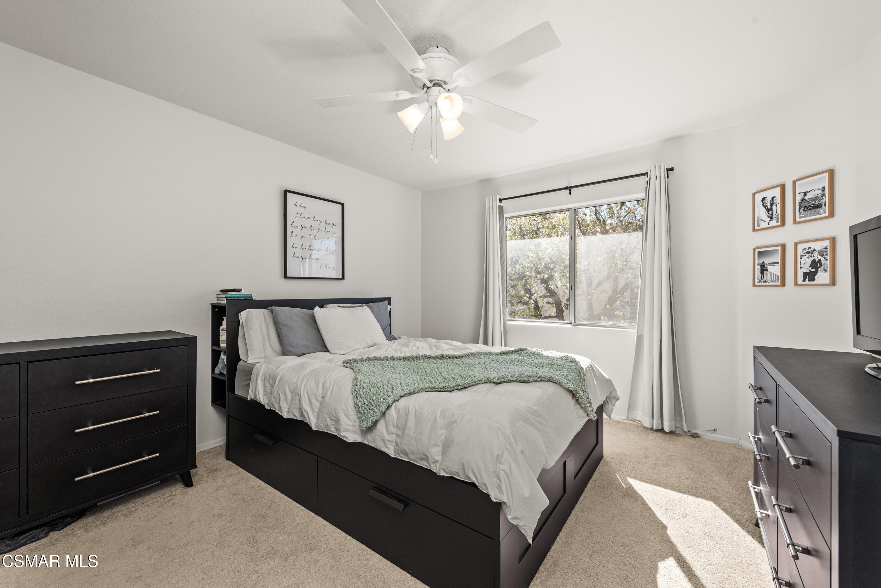 1730 Sinaloa Road, Unit 310 Simi Valley, CA 93065 - Photo 16 of 36 a spacious bedroom with a bed and a dresser