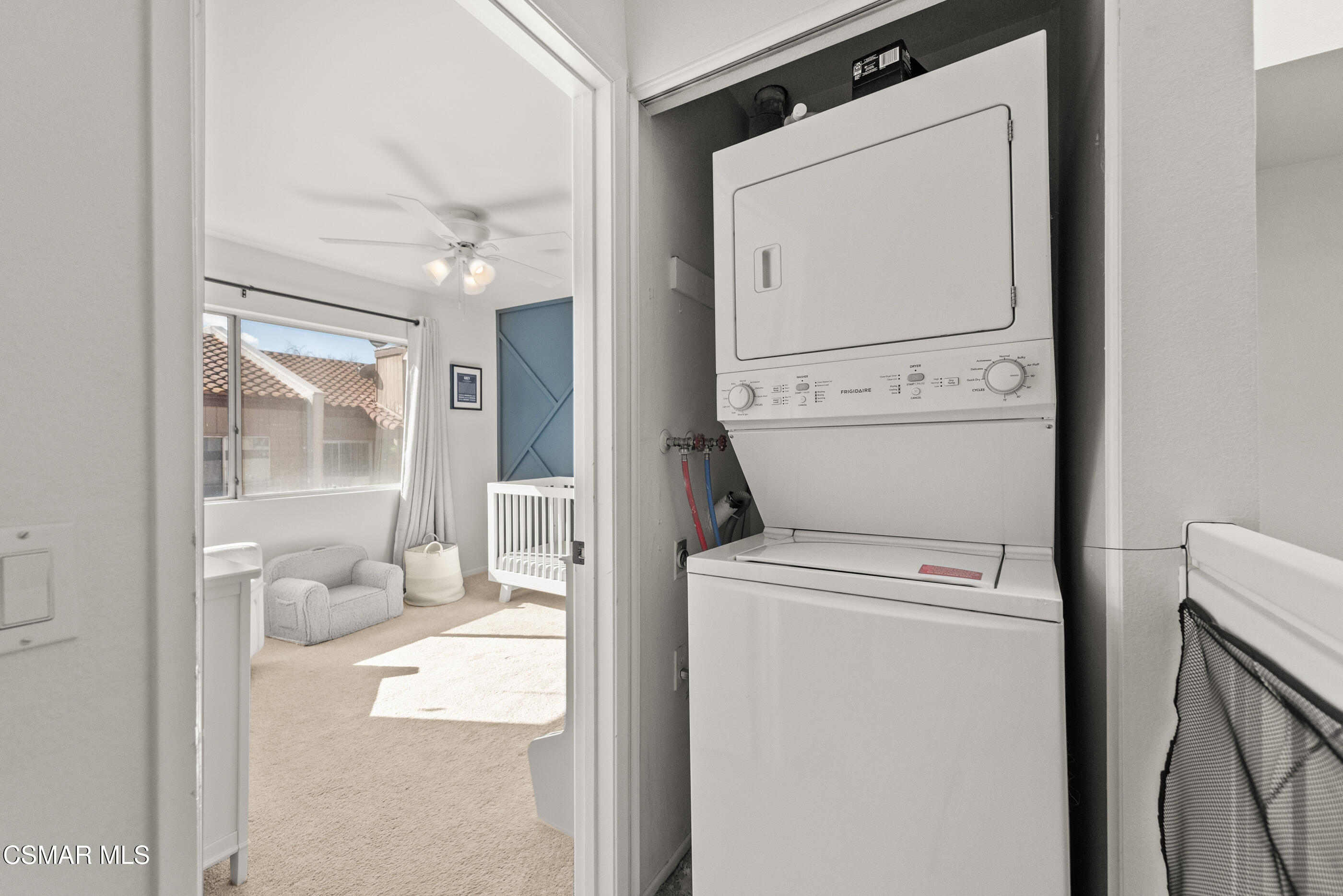 1730 Sinaloa Road, Unit 310 Simi Valley, CA 93065 - Photo 20 of 36 a utility room with dryer and washer