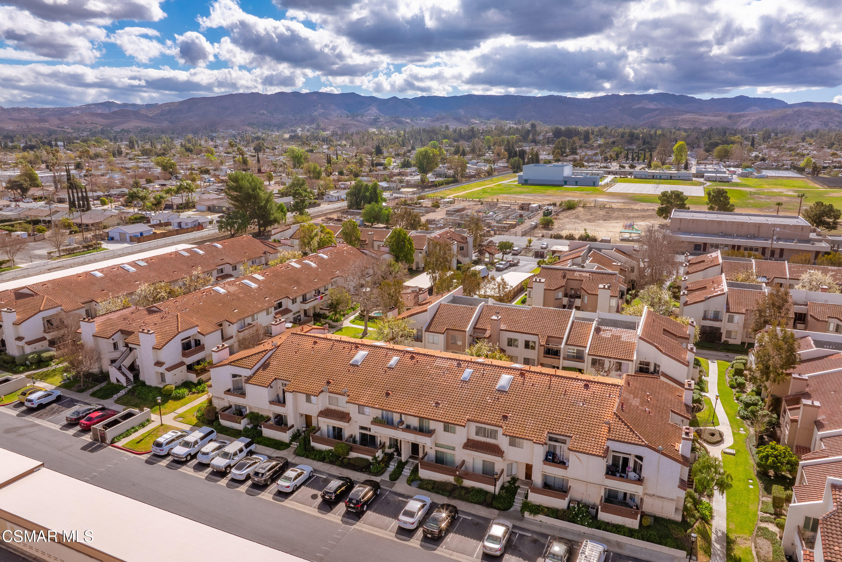 1730 Sinaloa Road, Unit 310 Simi Valley, CA 93065 - Photo 27 of 36 an aerial view of a city with streets and houses