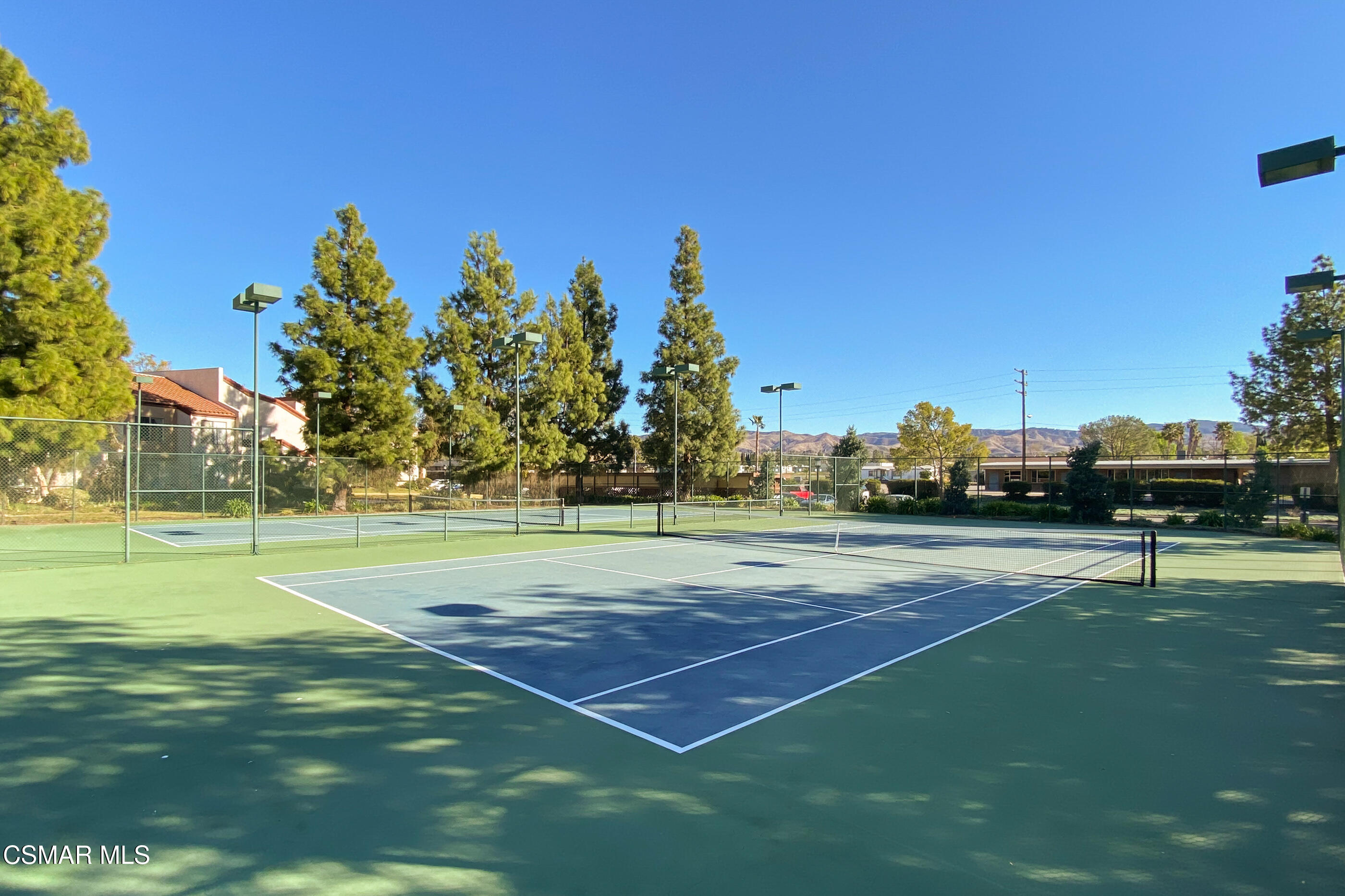 1730 Sinaloa Road, Unit 310 Simi Valley, CA 93065 - Photo 34 of 36 a view of an outdoor space and tennis court