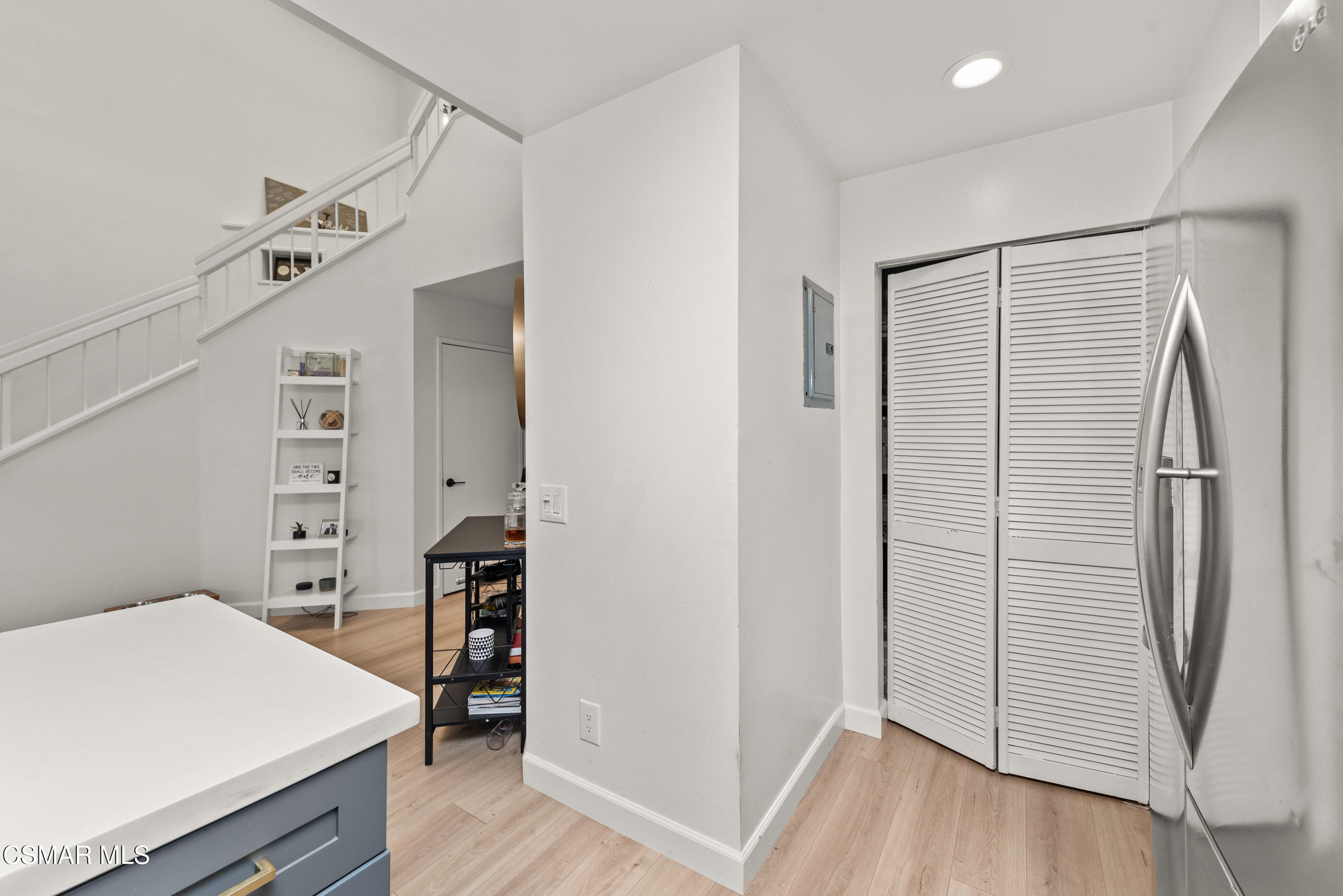 1730 Sinaloa Road, Unit 310 Simi Valley, CA 93065 - Photo 9 of 36 a view of a storage & utility room with wooden floor
