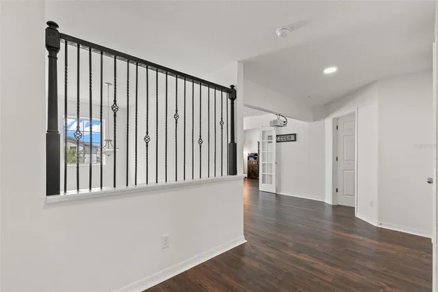 a bedroom with a bed and a table in it