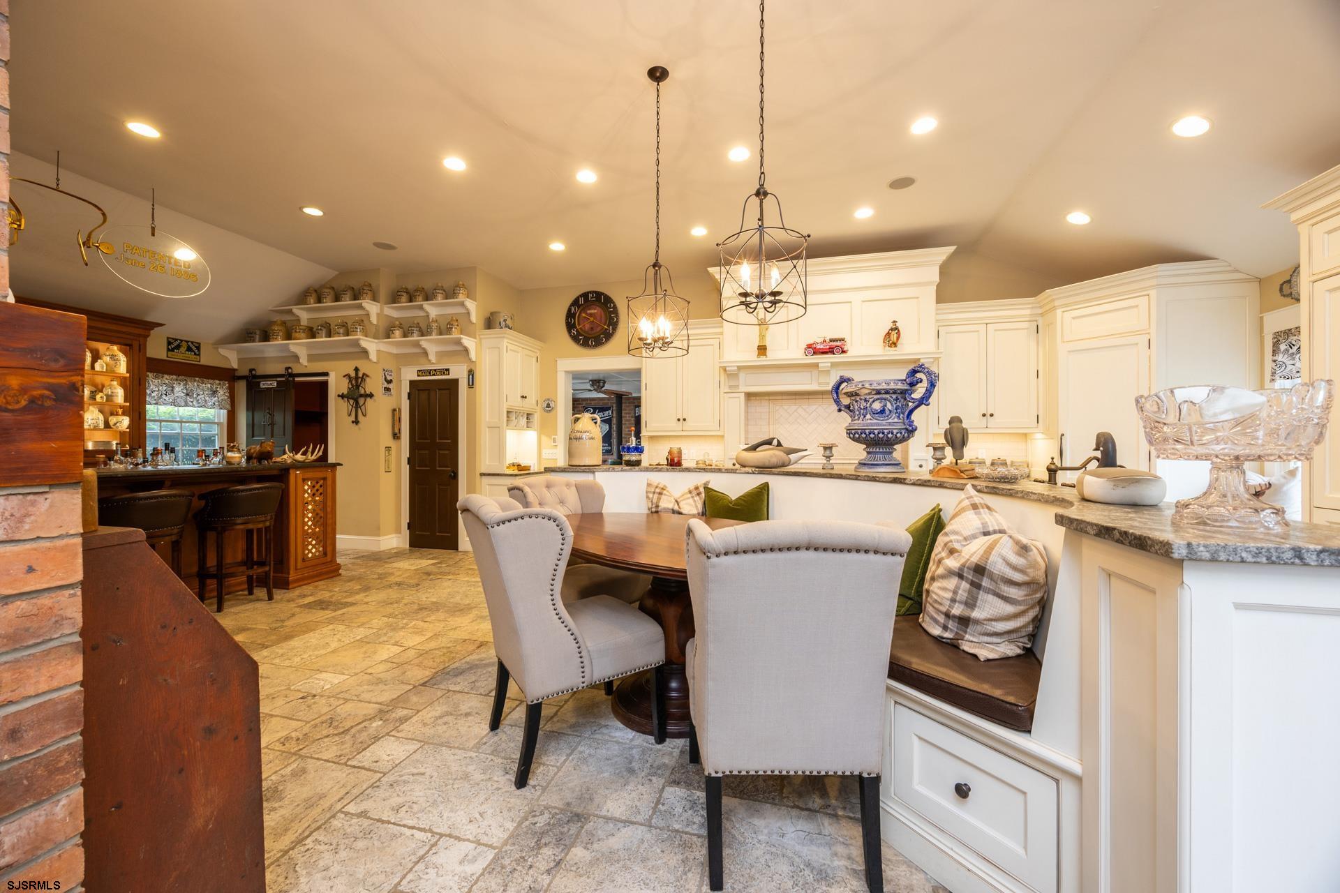 3065 North Route 9 Ocean View, NJ 08230 - Photo 25 of 99 a dining room with kitchen island furniture a kitchen view and appliances