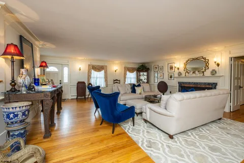 a room with furniture and flat screen tv