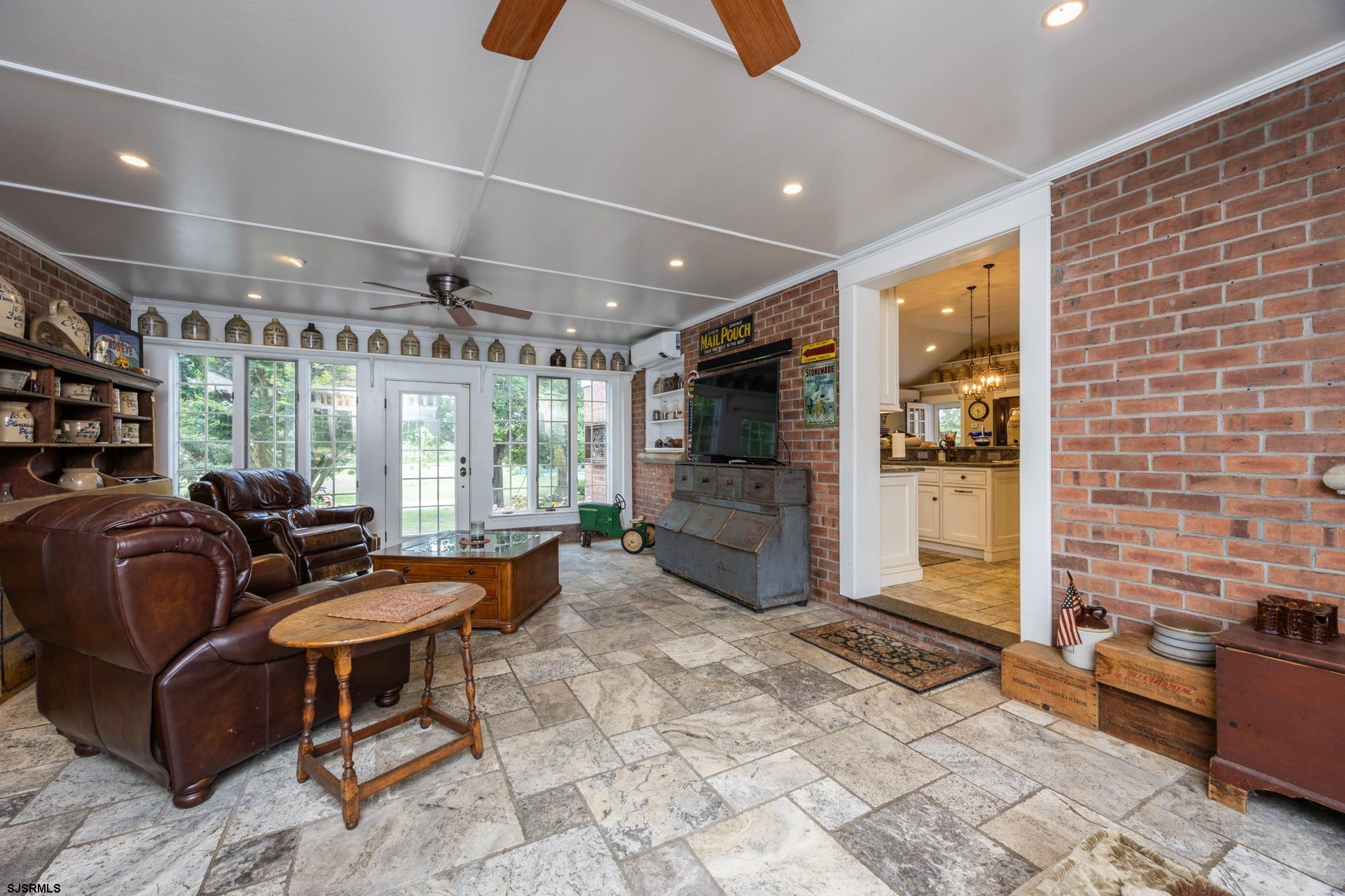 3065 North Route 9 Ocean View, NJ 08230 - Photo 41 of 99 a living room with patio furniture and a flat screen tv