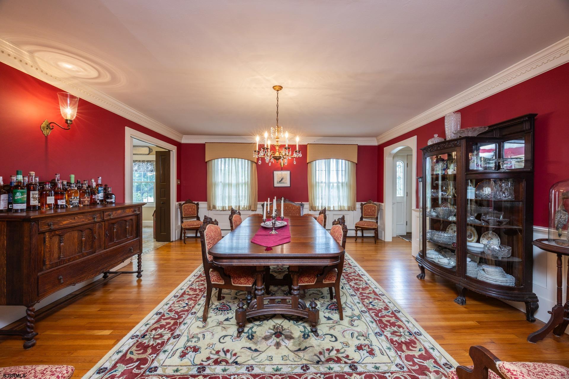 3065 North Route 9 Ocean View, NJ 08230 - Photo 44 of 99 a living room with furniture a rug and a chandelier