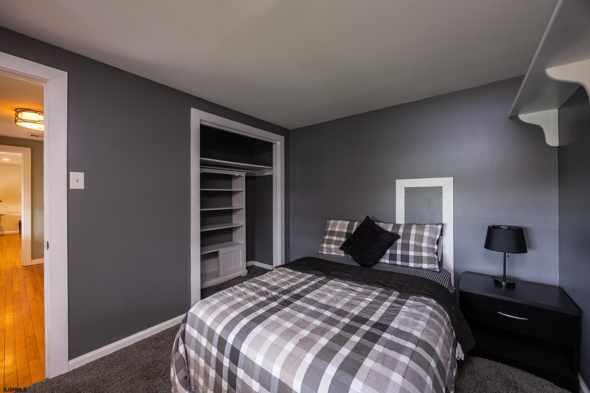 3065 North Route 9 Ocean View, NJ 08230 - Photo 49 of 99 a bedroom with a bed and a television