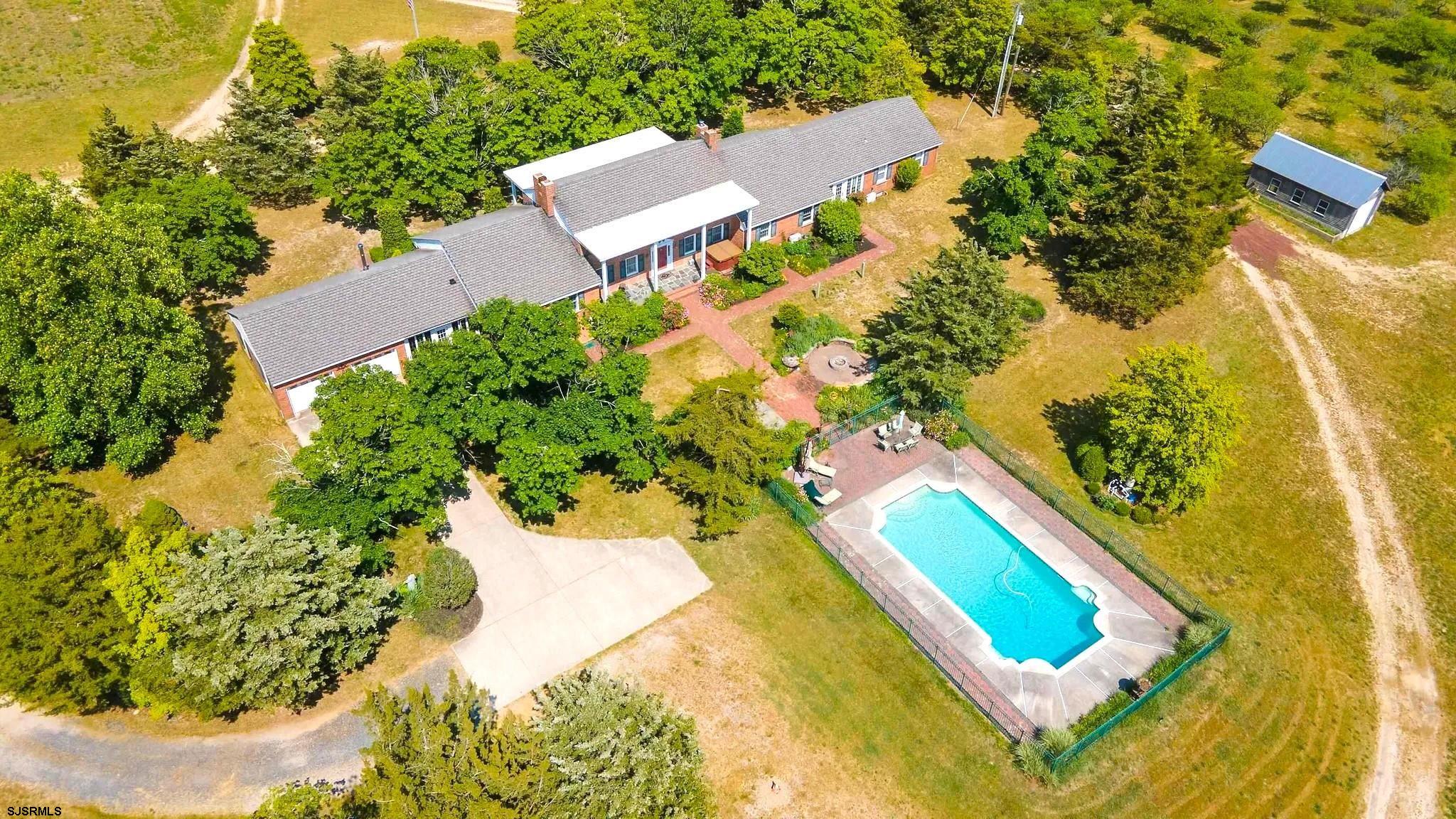 3065 North Route 9 Ocean View, NJ 08230 - Photo 5 of 99 an aerial view of a house with a swimming pool