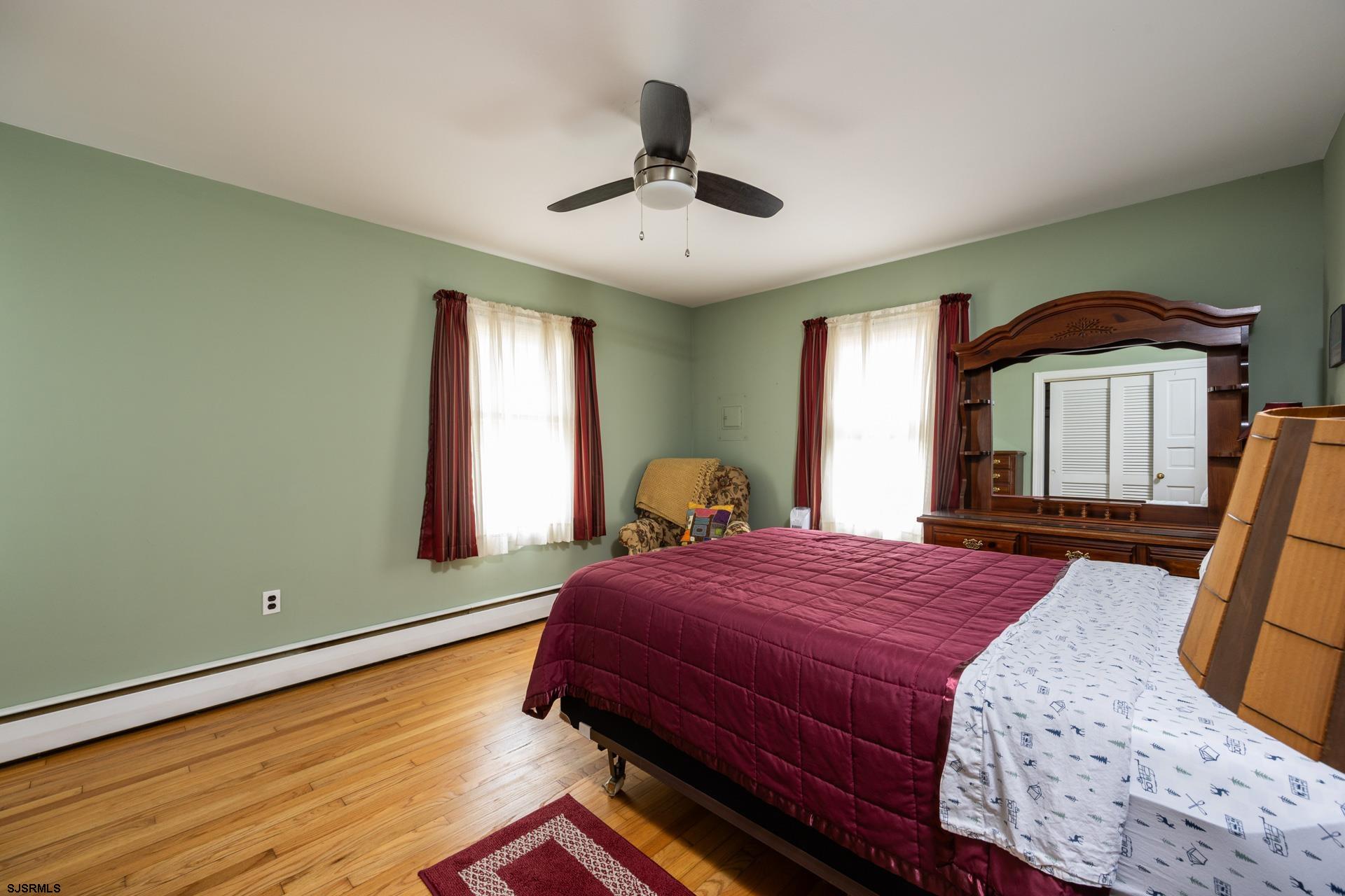 3065 North Route 9 Ocean View, NJ 08230 - Photo 58 of 99 a bedroom with a bed and a large window