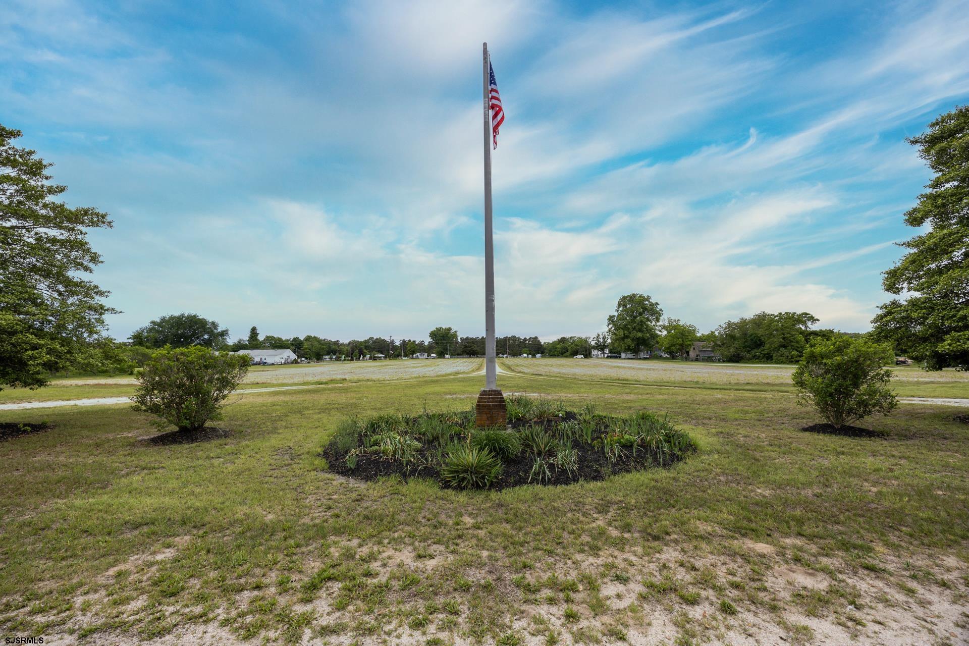 3065 North Route 9 Ocean View, NJ 08230 - Photo 94 of 99 a view of a garden with a lake
