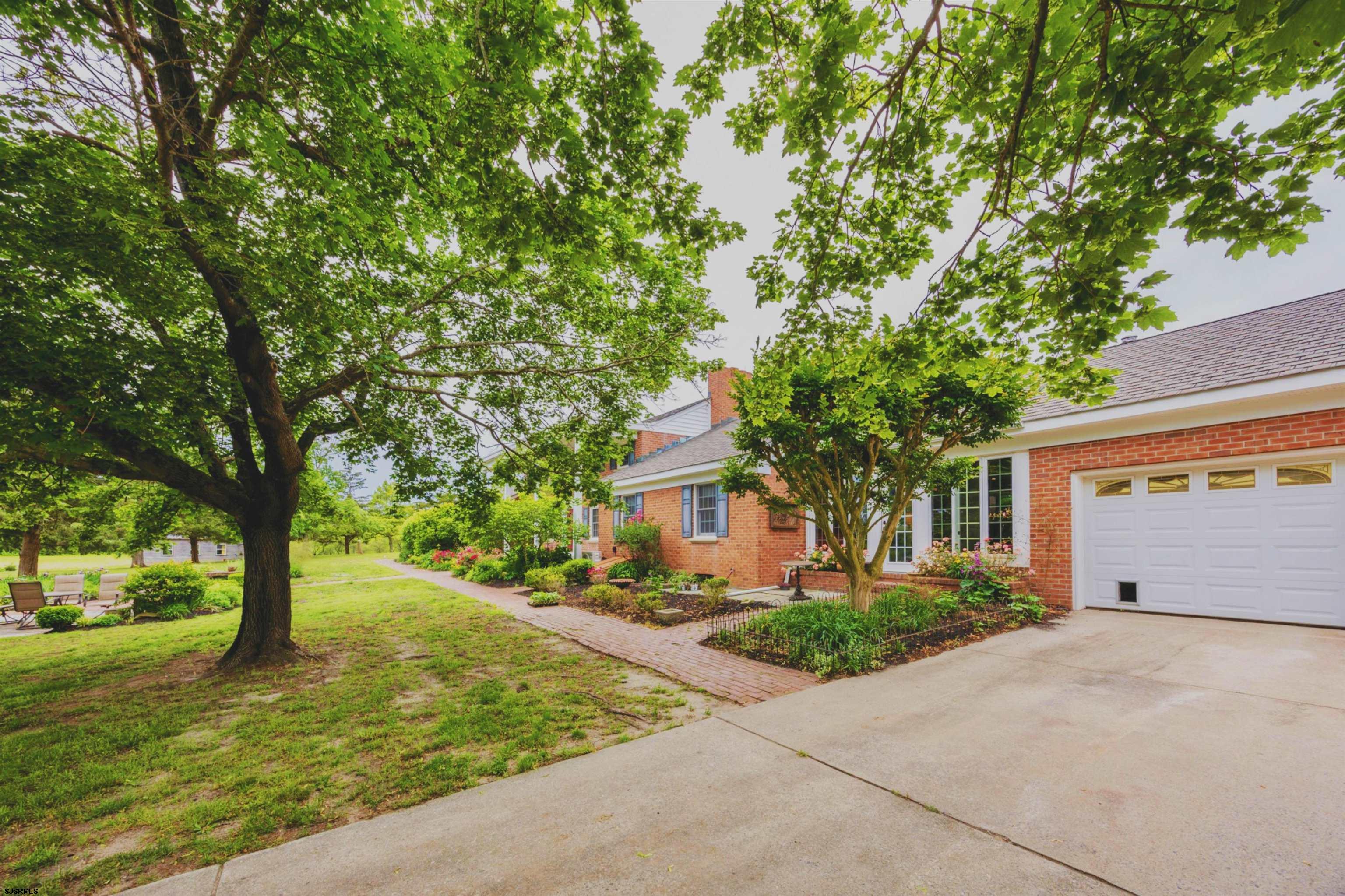 3065 North Route 9 Ocean View, NJ 08230 - Photo 10 of 99 a front view of house with yard and green space