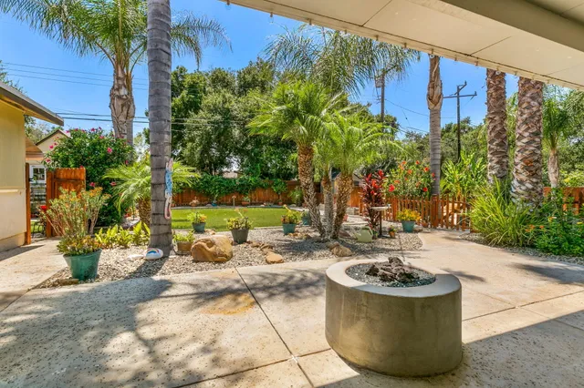 a view of a swimming pool with a patio