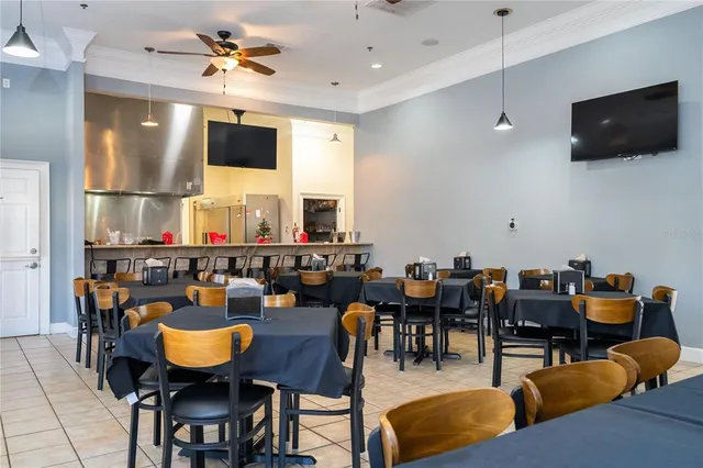 a view of a dining room with furniture
