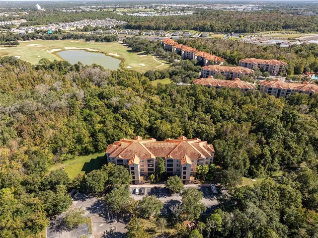 a bathroom with a shower a sink and a mirror