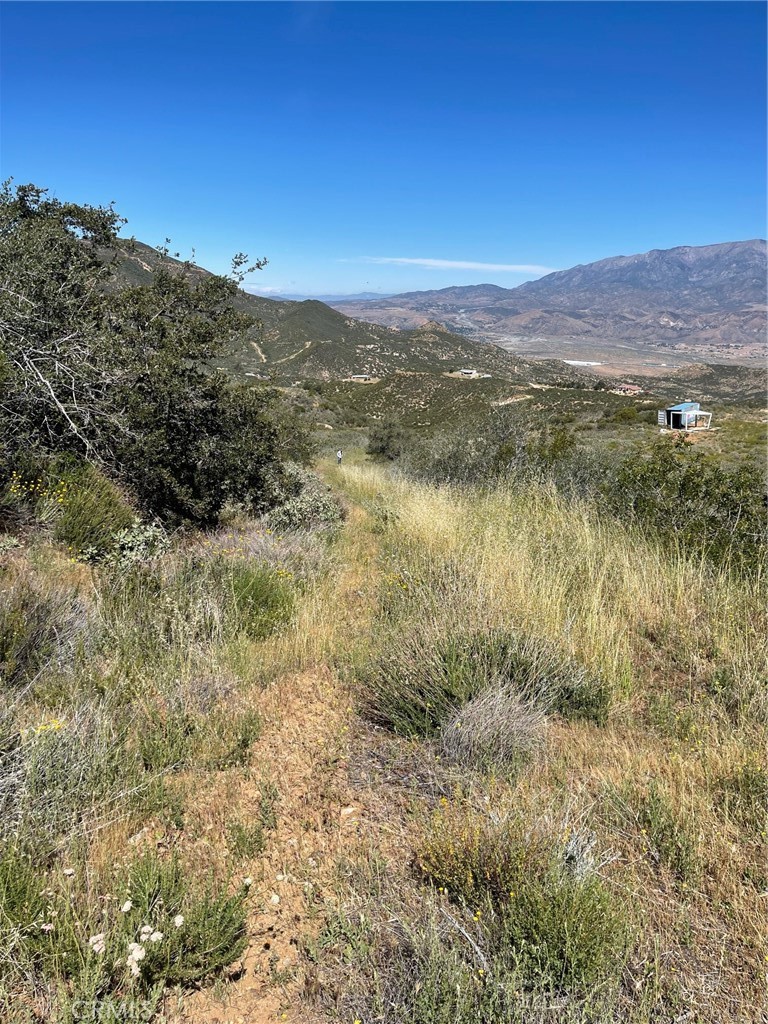 48910 Twin Pines Road Banning, CA 92220 - Photo 4 of 11 a view of lake with mountain