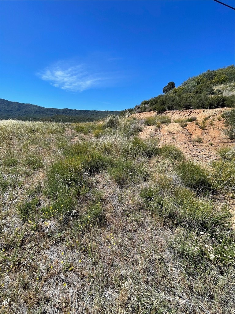 48910 Twin Pines Road Banning, CA 92220 - Photo 6 of 11 a view of a large building with mountains in the background