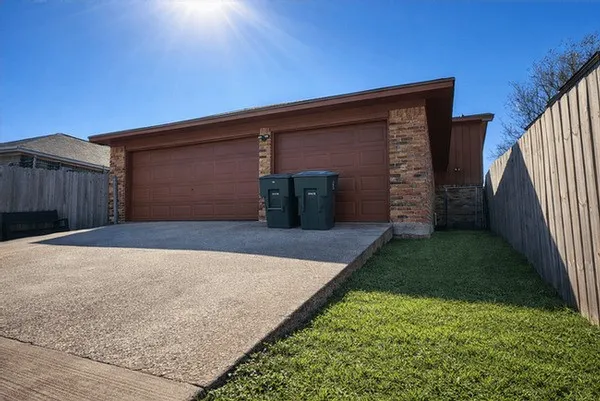 a view of a backyard of the house