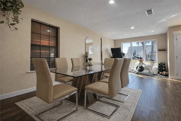 a view of a dining room with furniture