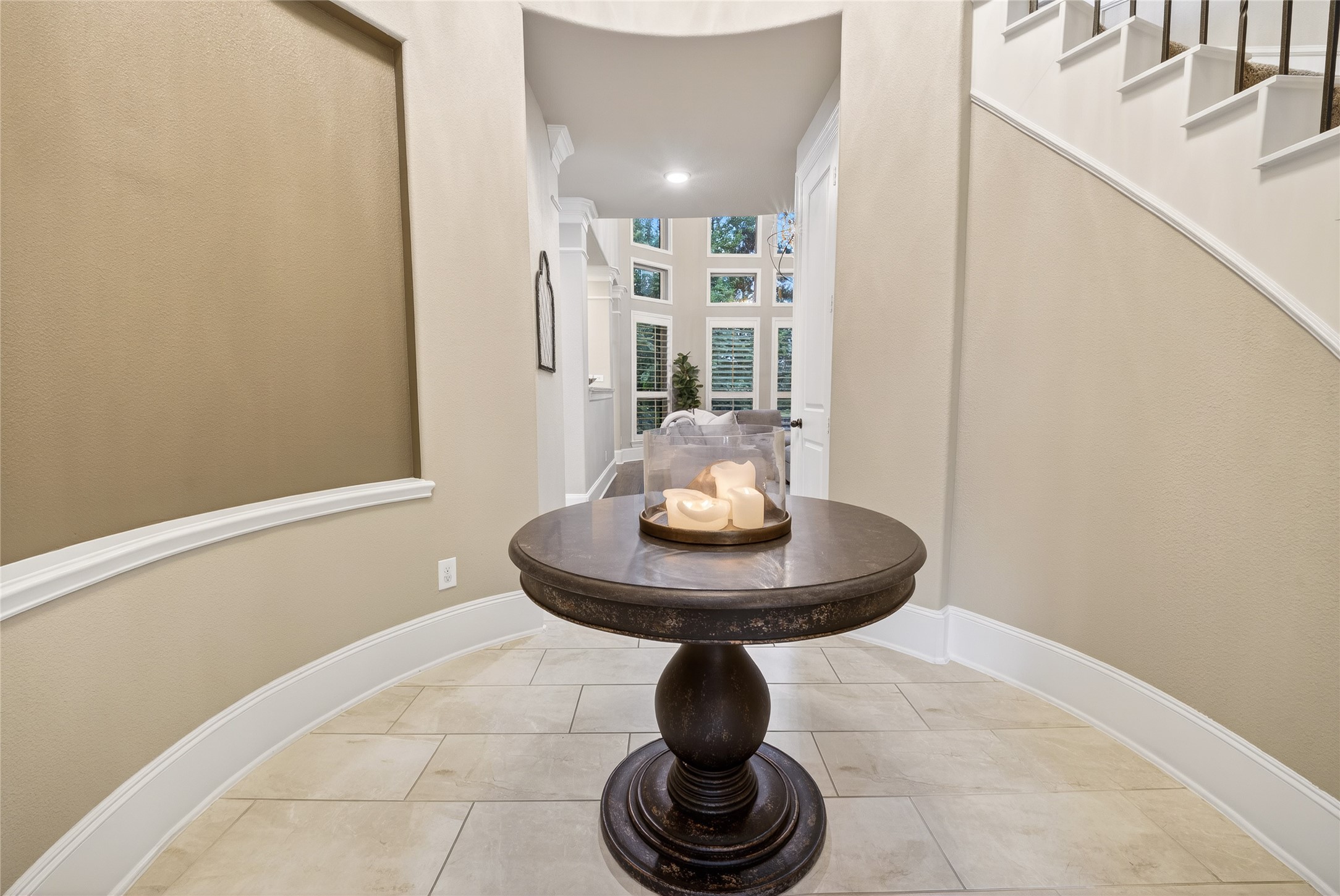 7907 Augusta Creek Court Spring, TX 77389 - Photo 9 of 49 Stunning entry leads you into the oversized kitchen and family room showcasing a wall of windows.