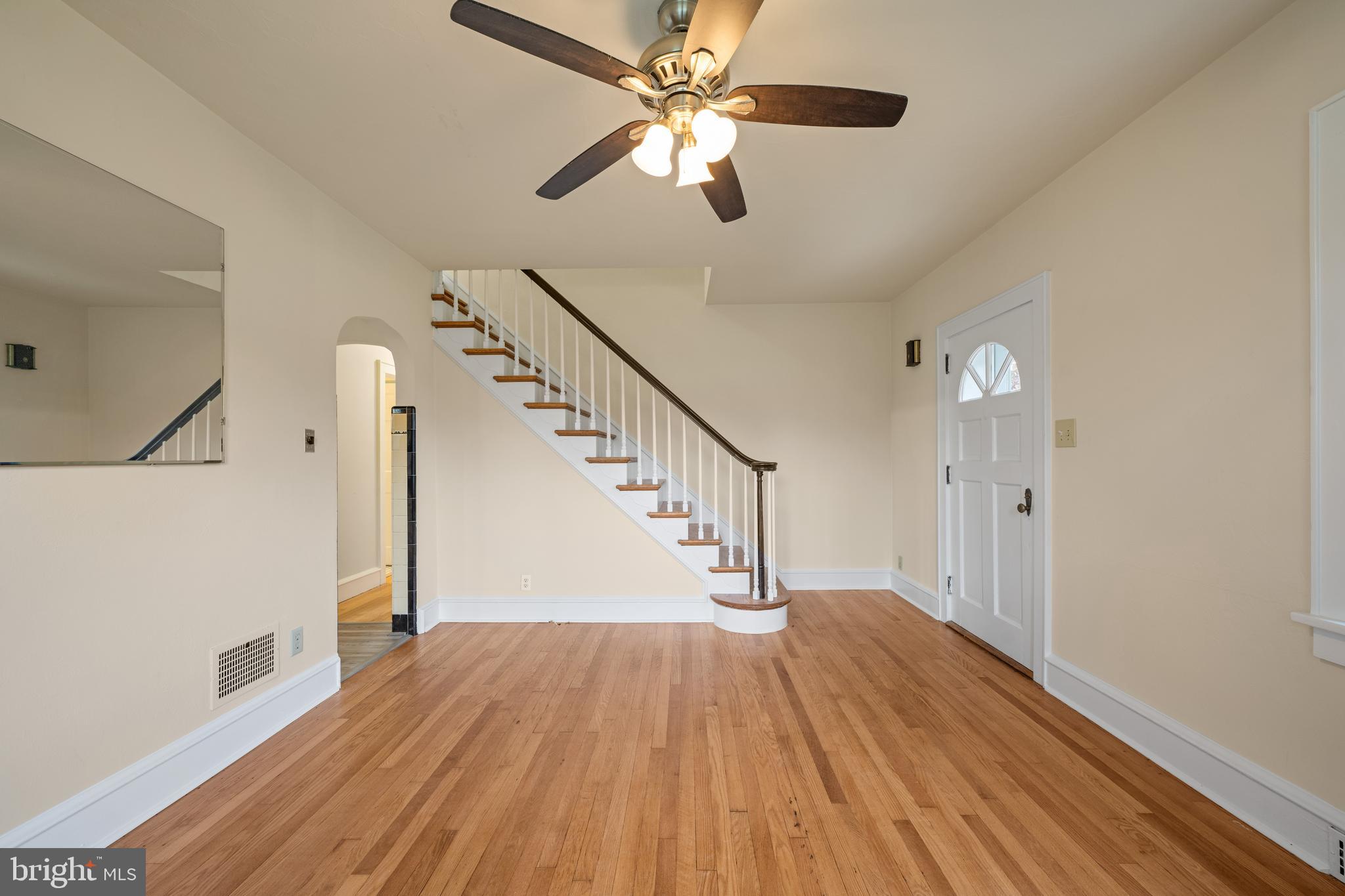 1547 East Wheat Road Vineland, NJ 08360 - Photo 14 of 32 a view of entryway and hall with wooden floor