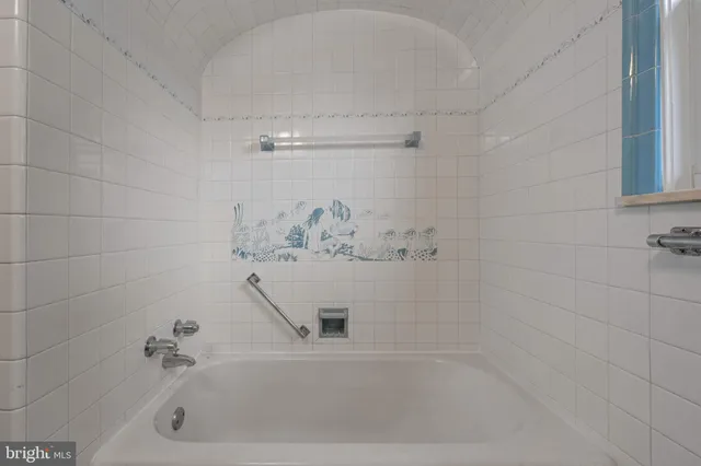 a bathroom with a bathtub