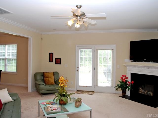 3212 Rendezvous Drive Raleigh, NC 27610 - Photo 4 of 12 Open & Inviting Family Room w/ Corner Fireplace