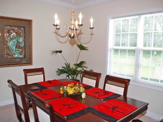 3212 Rendezvous Drive Raleigh, NC 27610 - Photo 7 of 12 Formal Dining Room w/ Easy Access to Kitchen