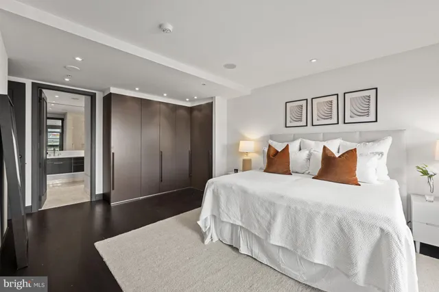 a bedroom with bed and window