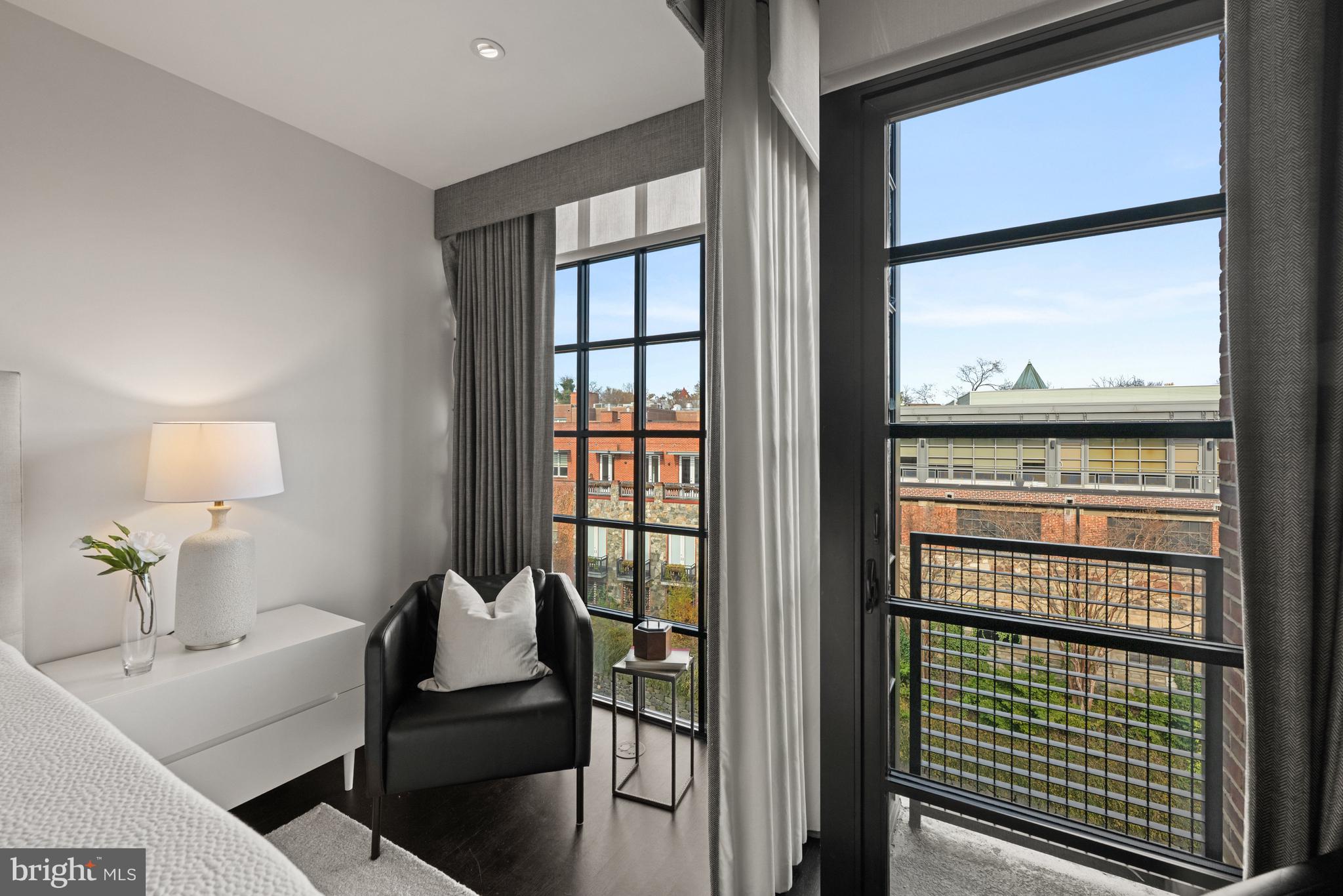 3303 Water Street Northwest, Unit 7E Washington, DC 20007 - Photo 14 of 29 a living room with furniture