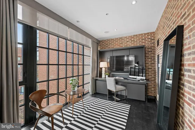 a view of walk in closet and bedroom view