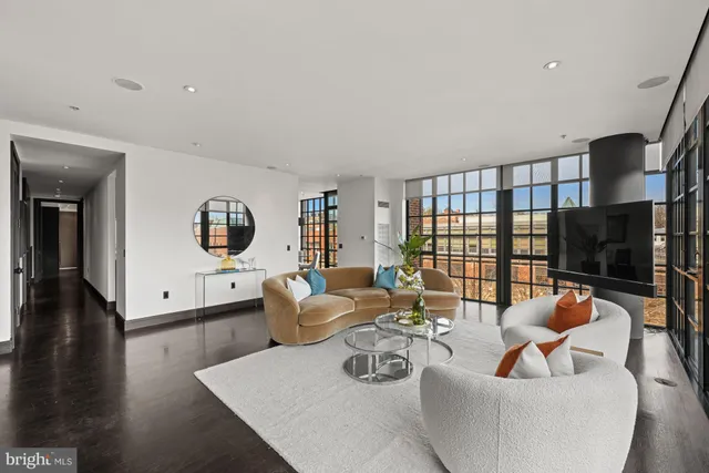 a kitchen with stainless steel appliances granite countertop a sink and a stove