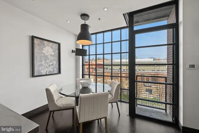 a hallway with toys and a potted plant