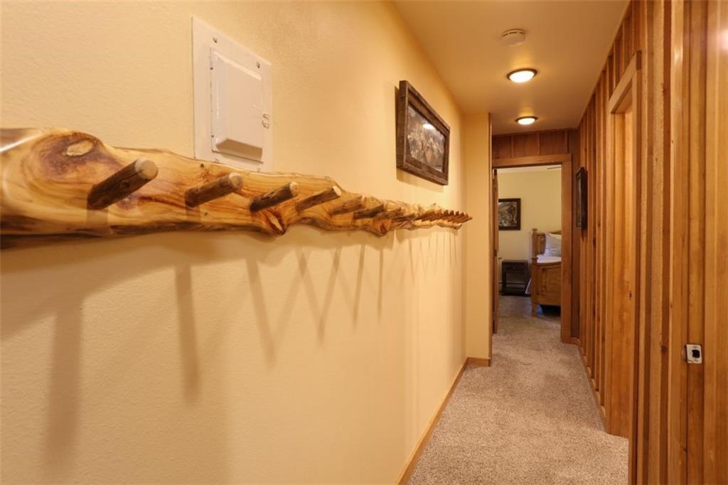 1080 Ski Hill Road, Unit 9 Breckenridge, CO 80424 - Photo 16 of 25 a bathroom with a bathtub and shower