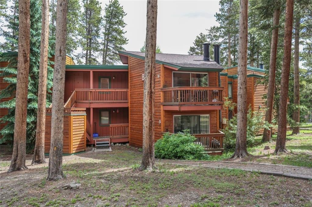 1080 Ski Hill Road, Unit 9 Breckenridge, CO 80424 - Photo 23 of 25 a front view of a house with a yard