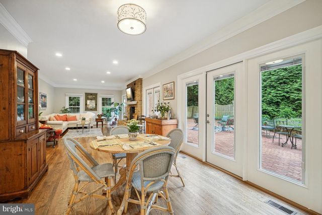 a living room with furniture or couch and a wooden floor