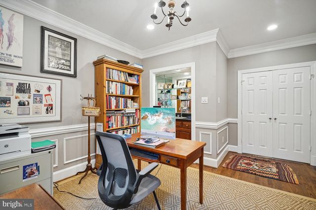 a bathroom with a sink vanity and a mirror