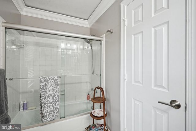 a utility room with sink dryer and washer