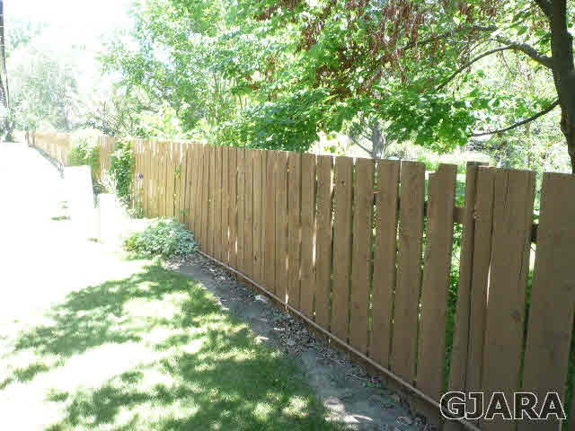 2721 Patterson Road, Unit 402 Grand Junction, CO 81506 - Photo 16 of 22 a view of a garden with wooden fence