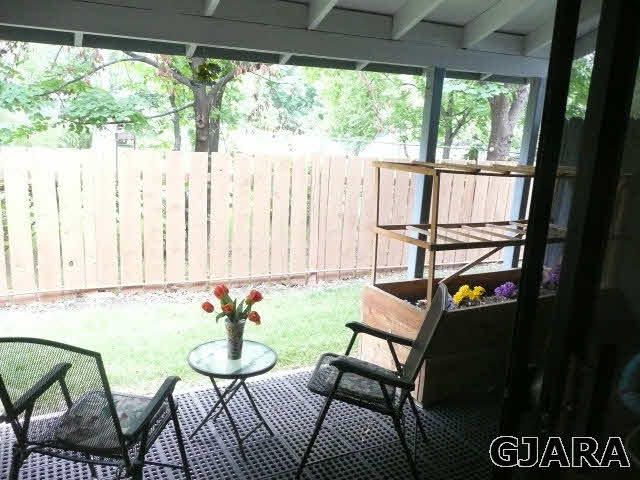 2721 Patterson Road, Unit 402 Grand Junction, CO 81506 - Photo 17 of 22 a room with furniture and a window