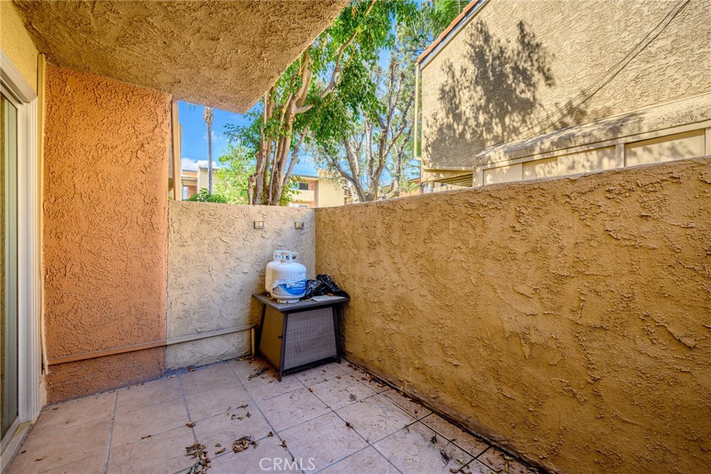 15425 Sherman Way, Unit 107A Van Nuys, CA 91406 - Photo 18 of 23 a view of a yard with an outdoor space