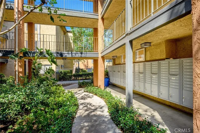 a view of a pathway along the building