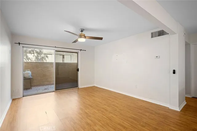 a view of wooden floor in an empty room