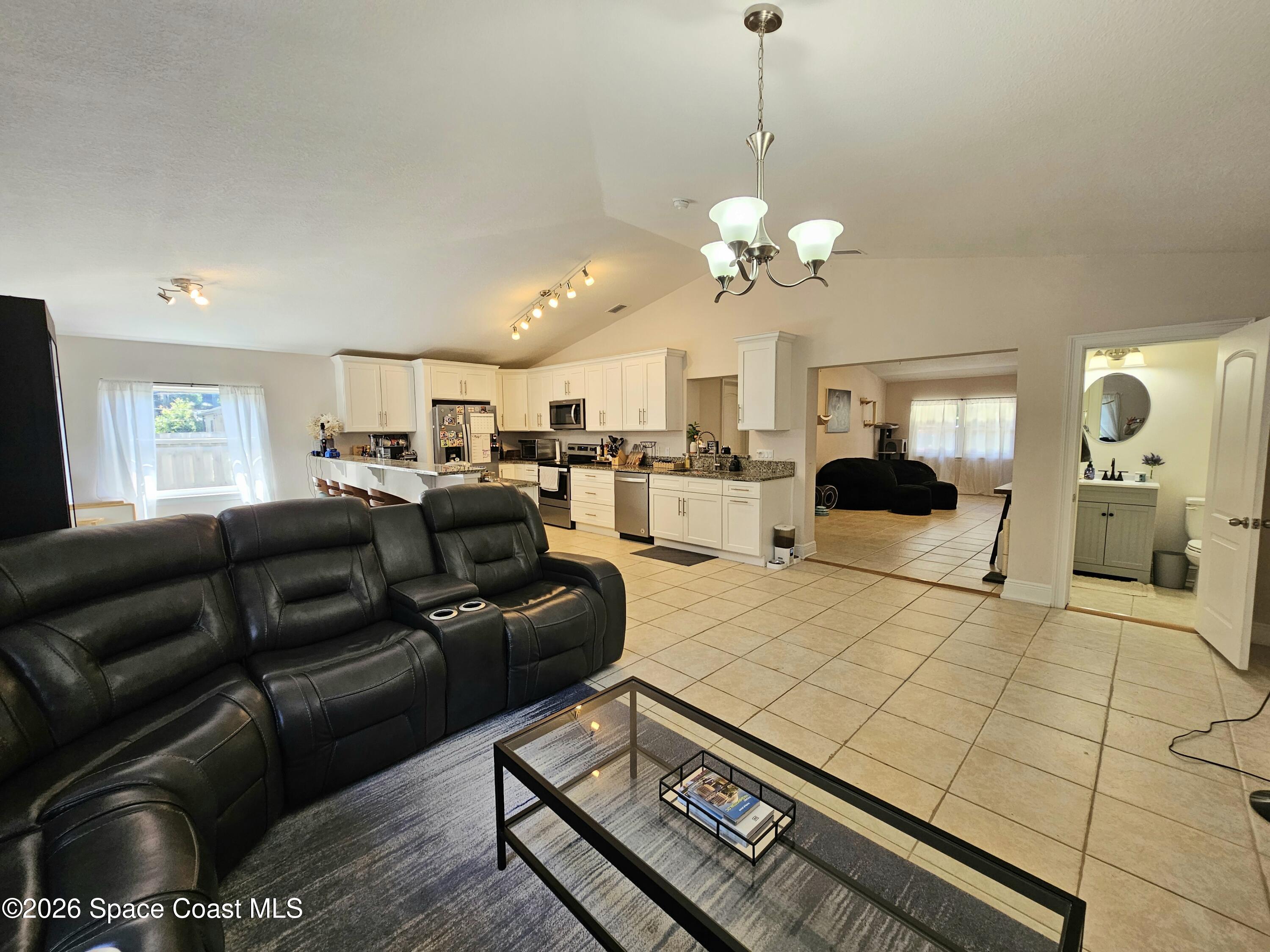 1044 Bernice Road Rockledge, FL 32955 - Photo 7 of 18 Living Room and Kitchen