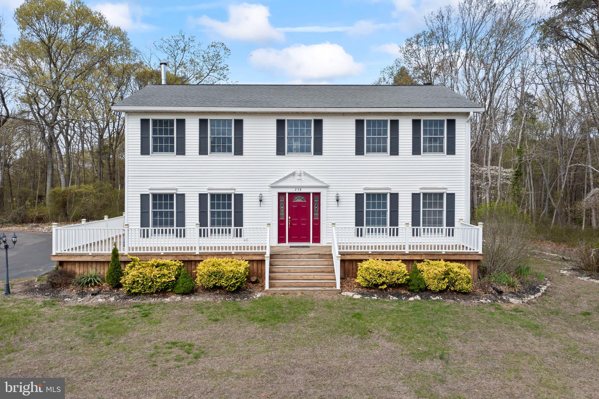 258 Cubby Hollow Road Bridgeton, NJ 08302 - Photo 1 of 52 a front view of house with yard