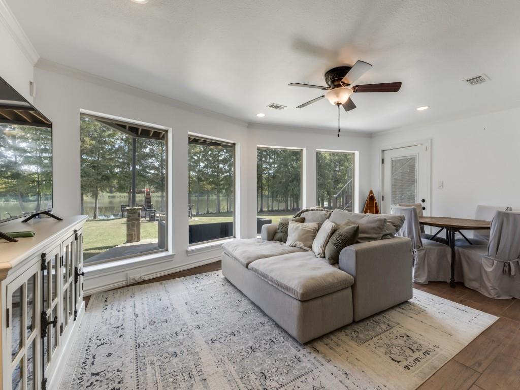 5848 Lago Vista Athens, TX 75752 - Photo 19 of 33 a living room with furniture and large windows
