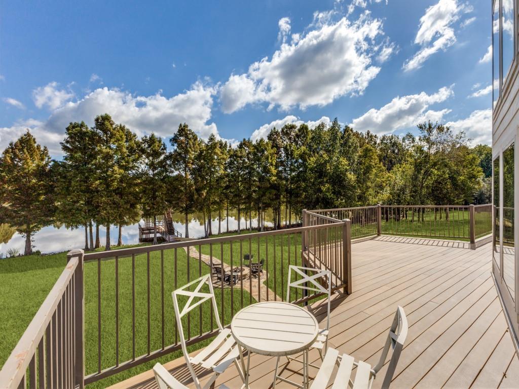 5848 Lago Vista Athens, TX 75752 - Photo 20 of 33 a view of a balcony with two chairs and a table
