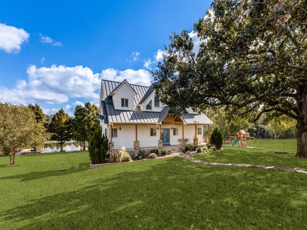 5848 Lago Vista Athens, TX 75752 - Photo 2 of 33 a front view of a house with a yard